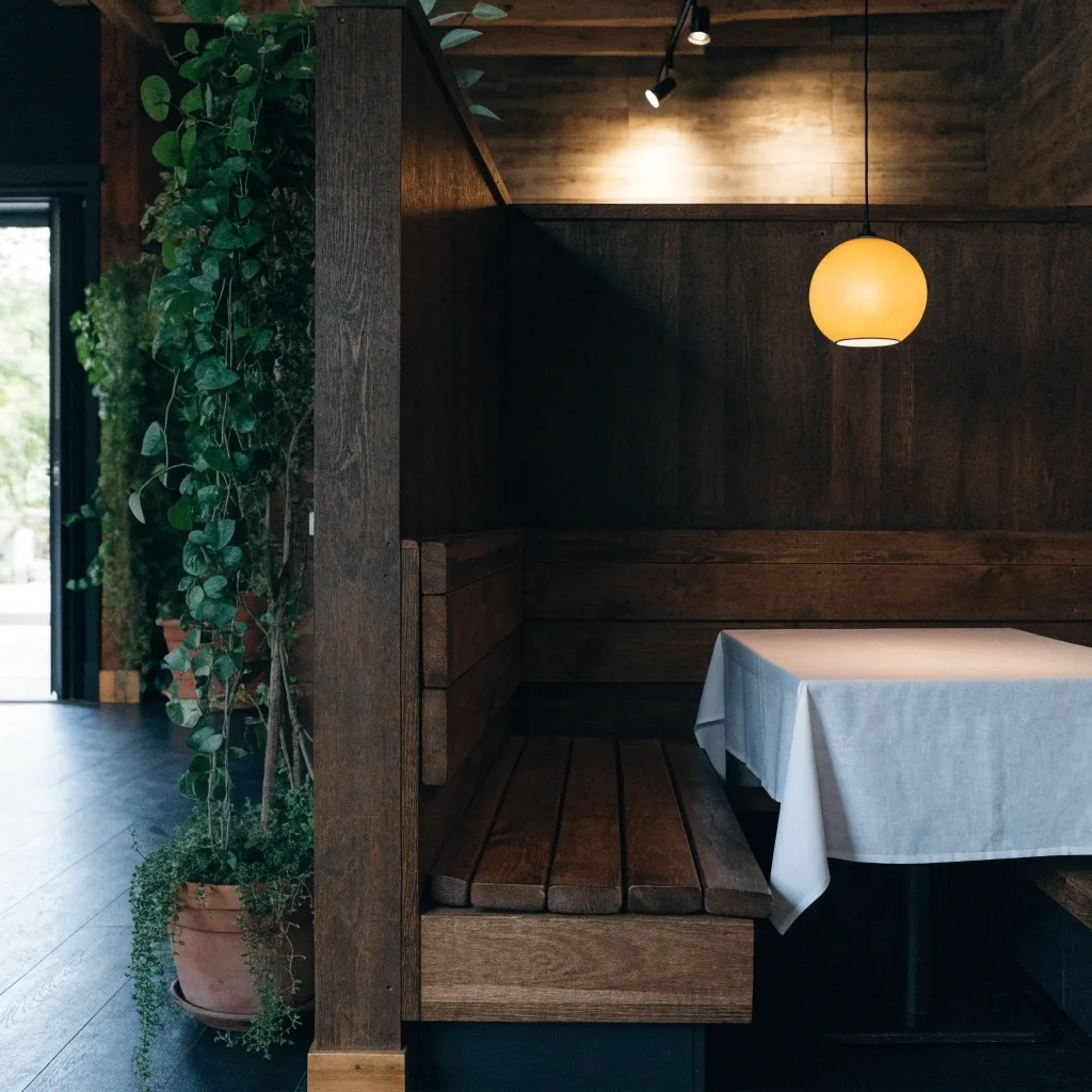 Quiet dining corner inside a Melbourne Guzman y Gomez before lunch
